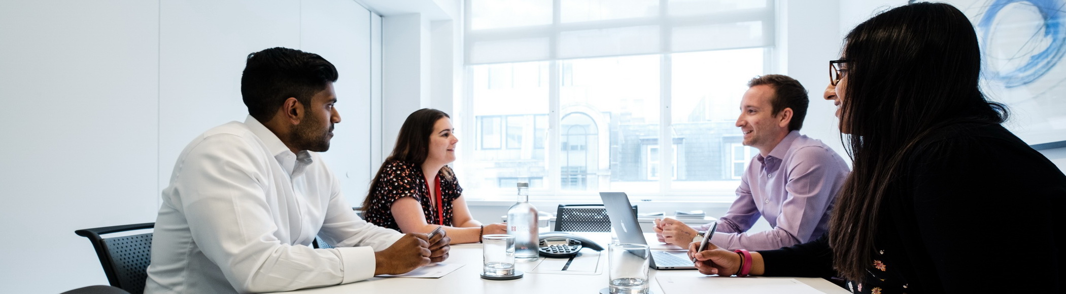 Meeting With Clients With Window In Background