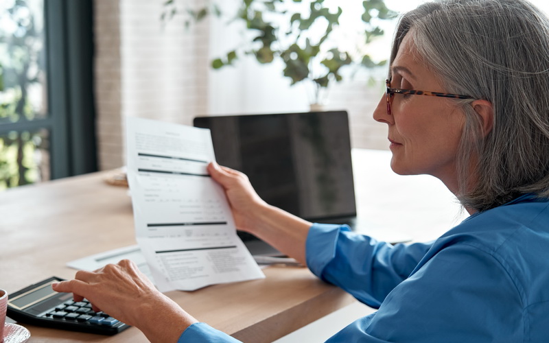 Woman completing paperwork