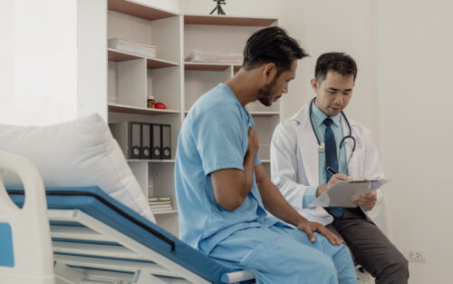 Doctor Seeing An NHS Patient